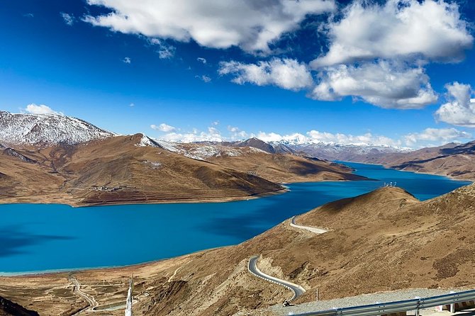 7 Days Lhasa to Kathmandu Overland Small Group Tibet Tour via EBC - Day 4 From Lhasa Toward Gyantse: Yamdrok Yumtso, Pass Stops, and Prayer Flags