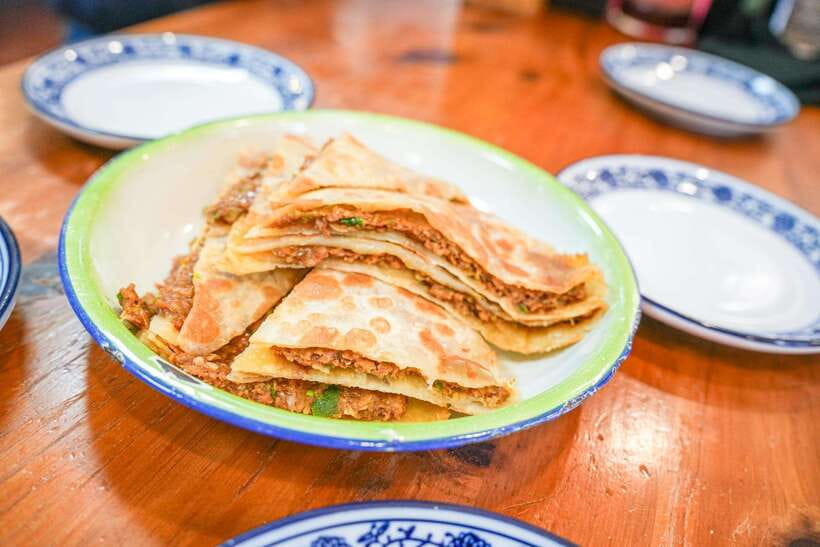 Beijing: Hutong Breakfast Food Tour - Hutong Secrets in Stone, Signs, and Courtyards