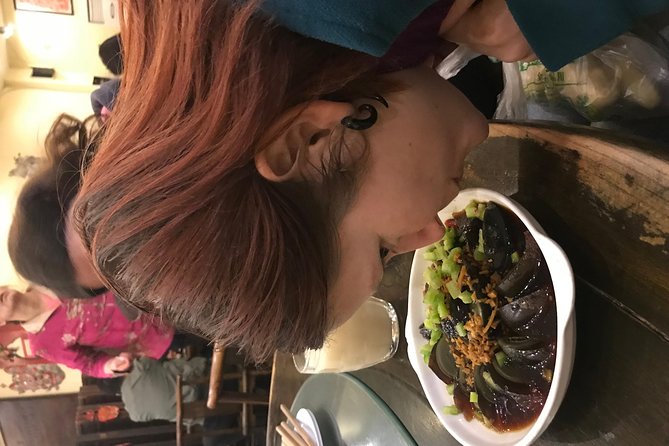 Beijing Private Hutong Food Walking Tour - LongFuSi Jie: the 20+ dish run where markets and small restaurants do the talking