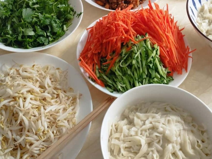 Beijing: Vegan Home Cooking & Local Market Tour with Sanxia - Tea ceremony timing and vegan dim sum breaks