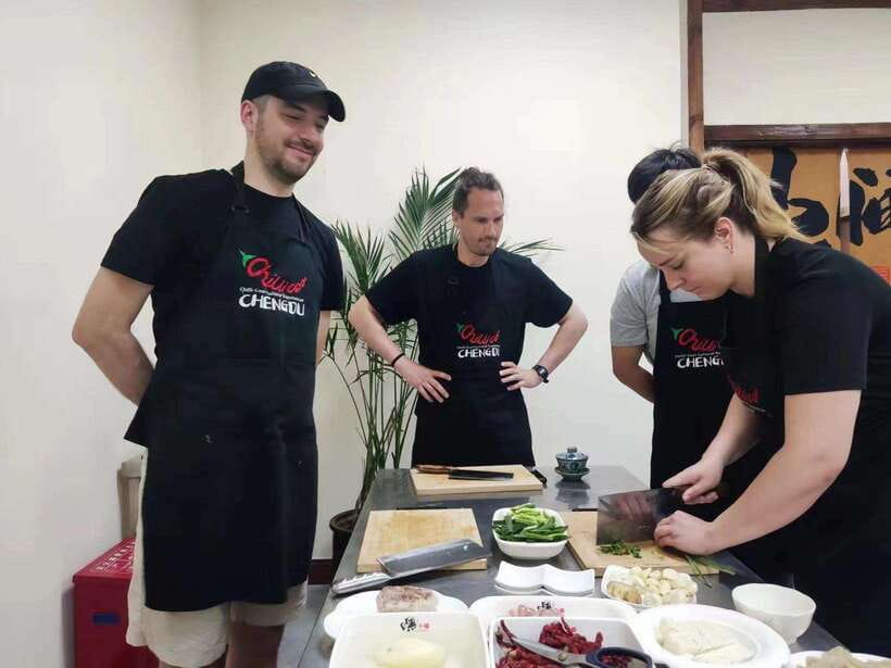 Chengdu: Cooking Class with Fresh Market Half Day Experience - Chef-led workshop cooking: how the stations and pace work