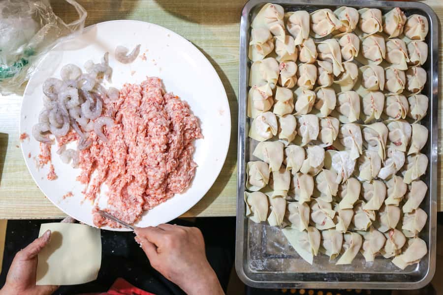 Chengdu: Hidden Dishes and Beers UNESCO Food Evening Tour - Stop 1: dumplings in a hidden residential community