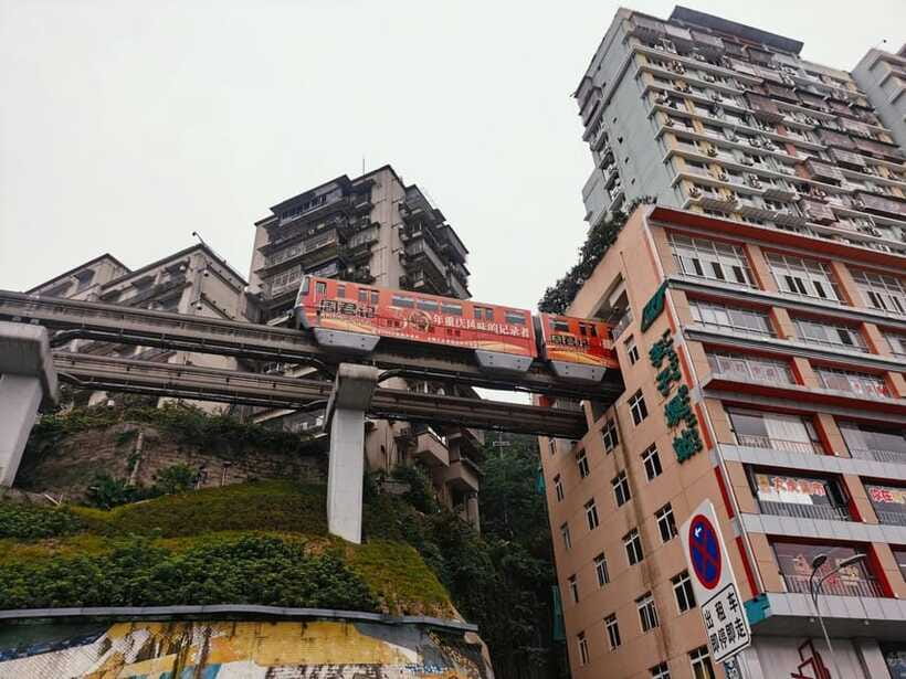 Chongqing: 1-day Essential Guided City Tour without Car - Liziba Monorail Station: train through the building