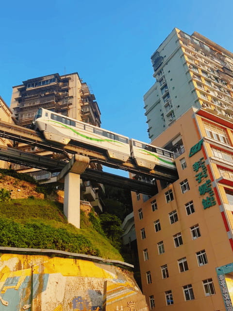 Chongqing Private City Tour: Must-Sees All-in-One - Liziba Station, monorail through a residential building