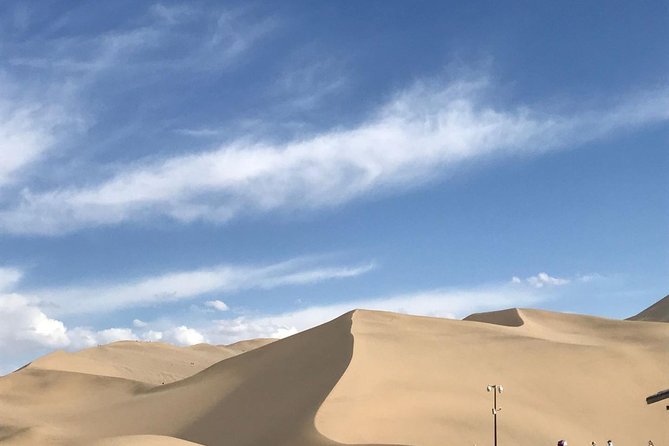 Dunhuang Private Day Tour Mogao Grottoes, Singing Dunes and Crescent Moon Spring - Key things I’d bet on before you go