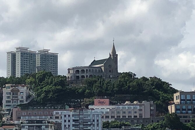 Full Day Macau Sightseeing Tour - Old Hotel Central stop: a quick landmark breather