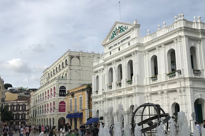 Full Day Macau Sightseeing Tour - Macau Tower: admire first, budget extra if you want the top