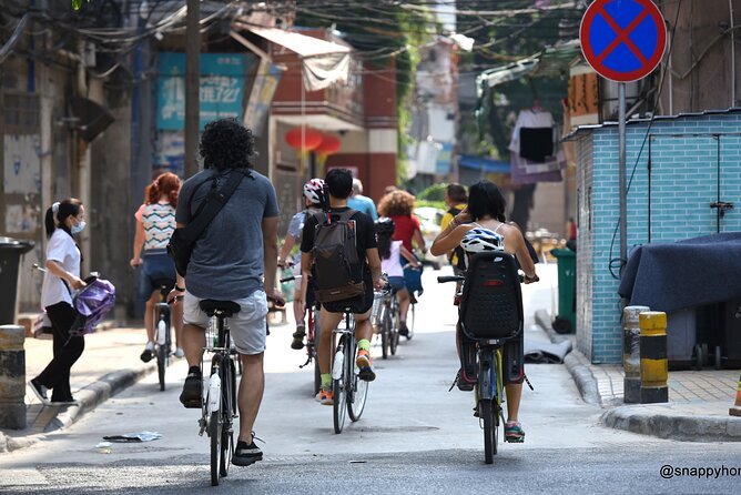 Guided Cycle Tour of Guangzhou - Entering Guangzhou by bike, old lanes to Pearl River skyviews