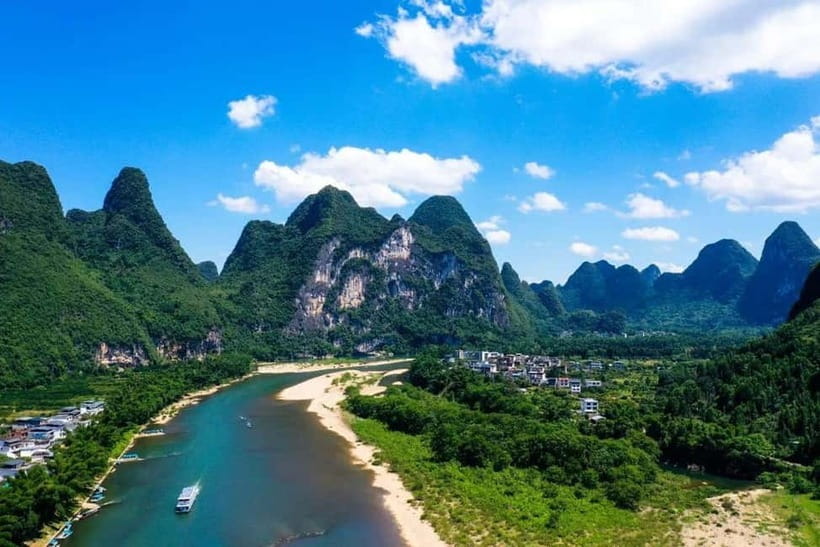 Guilin: Li River Cruise, Yangshuo Biking & Flexible Pricing - From Guilin pickup to the pier, in under two hours