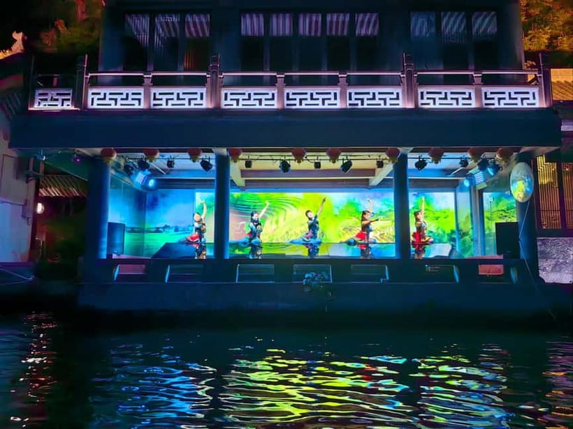 Guilin: Night Cruise on Two Rivers & Four Lakes with Lights - The light show priorities: Twin Pagodas and musical fountains