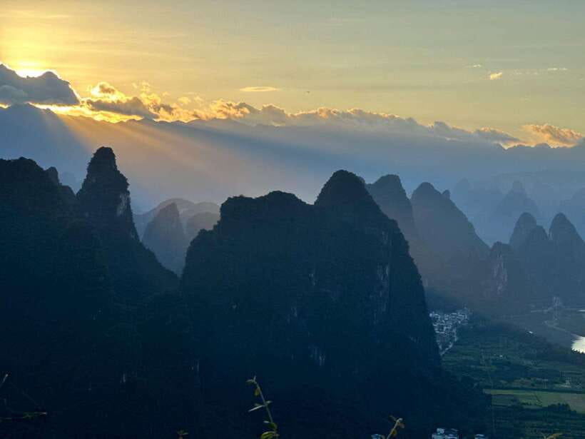 Guilin: Private Mountains and Rivers Day Tour - Yulong River Bamboo Boat: The Calmer Side of the Karsts