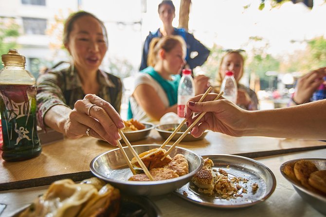 Half-Day Bike Tour of Shanghai Old Town with Food Tasting - Pedaling to Fuxing Park: locals, traditions, and everyday activity