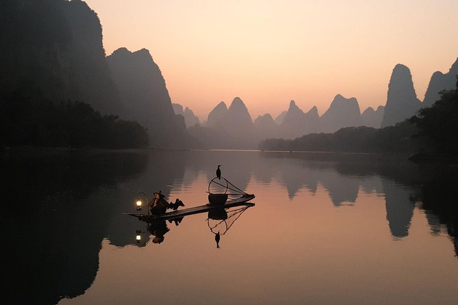 Half-day Xingping photographic Sunrise tour with the Fisherman - The fisherman routine: Cormorant birds, lanterns, and river trust