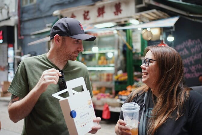 Hong Kong Street Food Tour with Locals - Dim Sum, Wonton & more - Wing Lok Street for har gow dumplings, and the dried seafood market shockwave