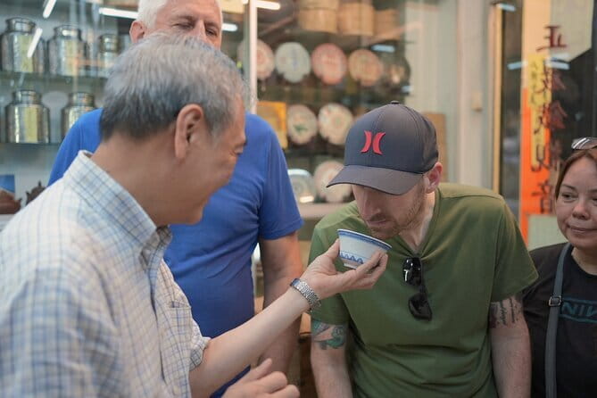 Hong Kong Street Food Tour with Locals - Dim Sum, Wonton & more - Bonham Strand West: how trade embargoes shifted Hong Kong’s whole game