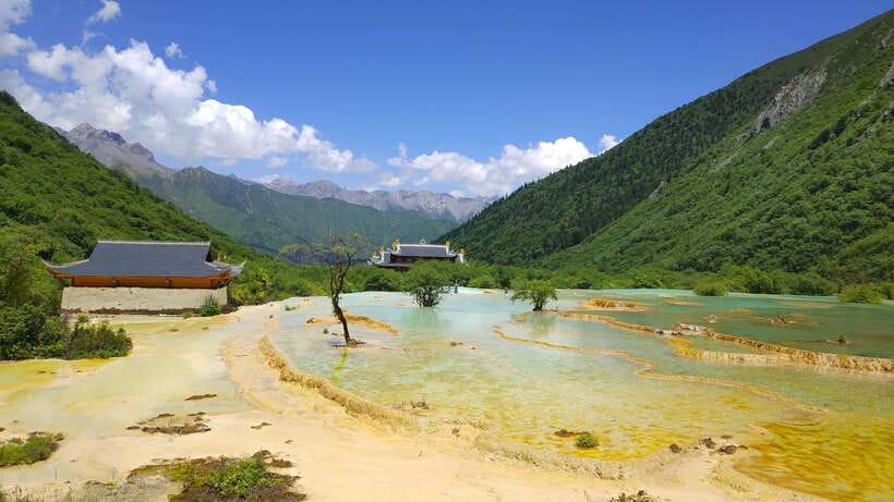 Huanglong Scenic Area: Explore Stunning Five-Colored Ponds - Golden Sand Pavement: the travertine stream walk you will remember