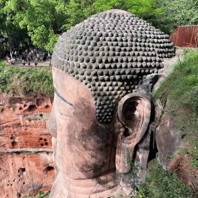 Leshan Giant Buddha Tour: Discover Ancient Stone Masterpiece - Lunch, Free Time, and Qiaojiao Beef-Style Tasting