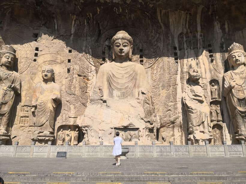 Luoyang: Longmen Grottoes Optional Tours or Tickets Only - Electric shuttles and the walking rhythm inside the site
