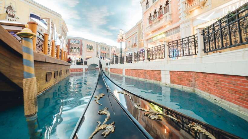 Macau: Venetian-Style Gondola Ride - What You See From the Gondola: bridges, storefronts, and painted skies