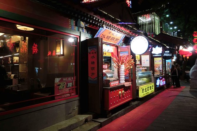Private Beijing Night Tour with Mr. Shi's Dumplings, Great Leap Brewing and Houhai Lake - Lanes and shops: Nanluoguxiang Hutong at night