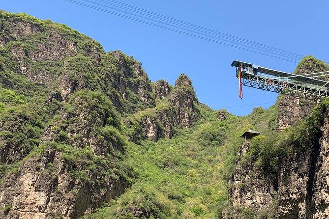Private Day Tour to Longqing Gorge and Dingling at the Ming Tombs with Lunch and Boat Ride - Longqing Gorge: the Flying Dragon escalator and the boat cruise
