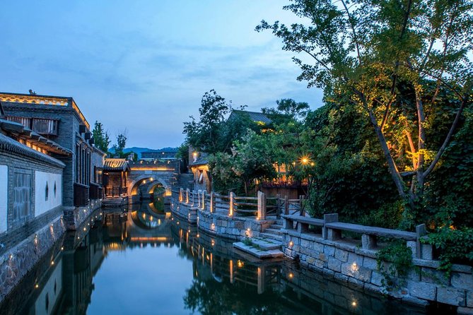 Private Evening Tour to Simatai Great Wall and Gubei Water Town - Simatai Great Wall at night: cable car access and lit watch towers