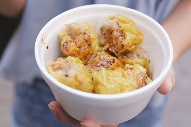 Private Food Tour in Hong Kong - Nathan Road: roast goose, pineapple buns, fish balls, and cha chan teng time