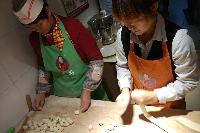 Private Hutong Culture Tour with Dumpling Cooking Class plus Cricket Fighting Game - Hutongs by rickshaw: narrow alleys, gates, and real neighborhood texture