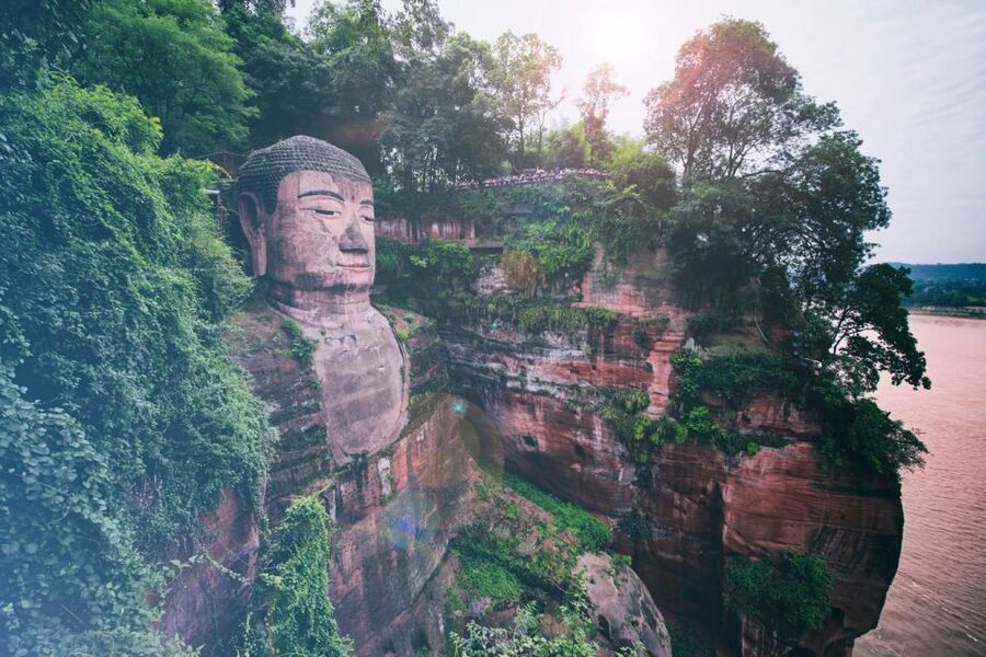 Private Tour to Leshan Giant Buddha & Huanglongxi Old Town - Main Street walking, banyan shade, and snack-and-shop time