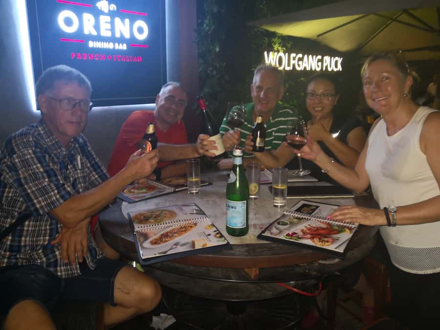 Shanghai: 4-Hour Nightlife Adventure & Tasting Bike Tour - Xintiandi at night: where the nightlife crowds gather