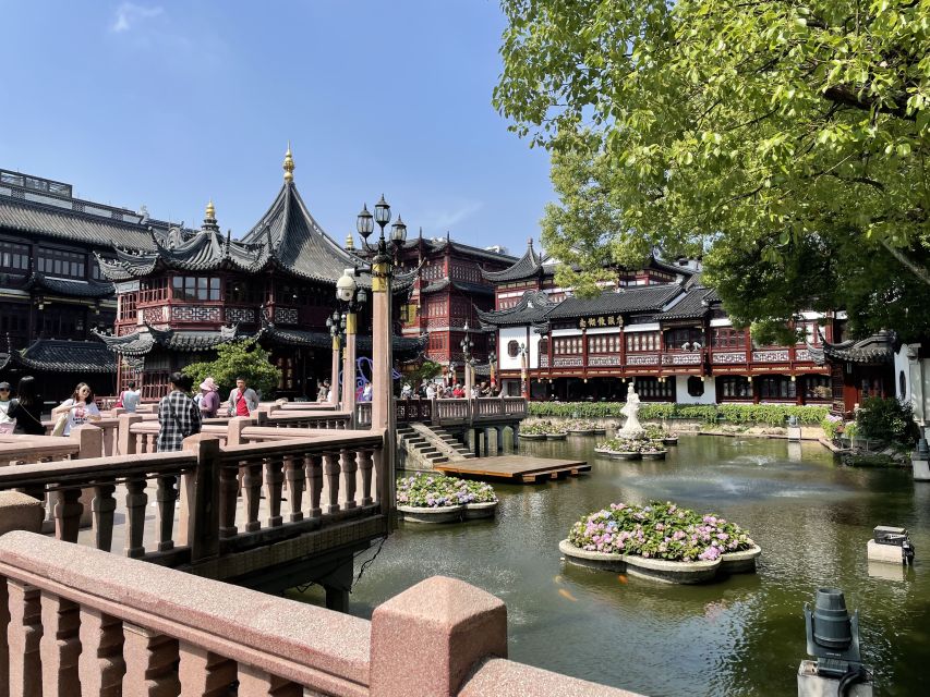 Shanghai: 8-Hour Guided Tour of Old and New City Highlights - Yuyuan Garden calm, pavilions, ponds, and smart photo time