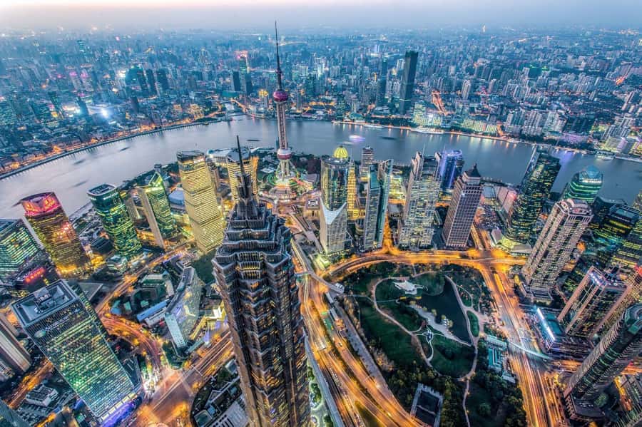 Shanghai Jinmao Tower 88th floor sightseeing hall - Architecture you can’t ignore: marble walls and a gold-lit atrium