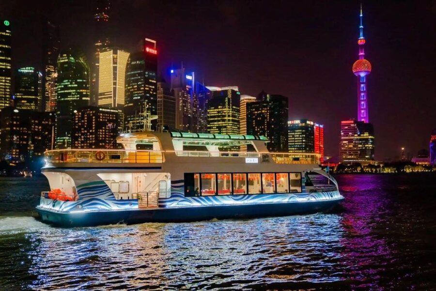 Shanghai: Night River Cruise Tour with Xinjiang Style Dining - On the Water After Sunset: What You See Along the Bund and Pudong