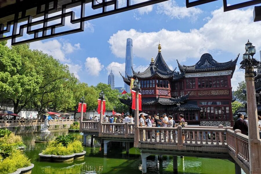 Shanghai: Yu Garden and City God Temple Walking Tour - Yu Garden Old Street: pajamas, family shops, and learning the rhythm of the area