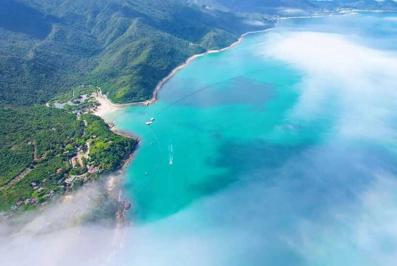 Shenzhen: Dapeng Peninsula Day Tour with Hotel Pickup - Judiaosha beach: white sand, shade, and real sea time