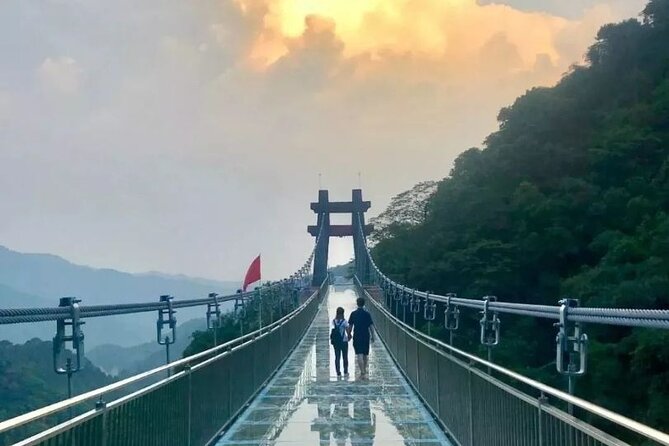 Skywalk Glass Bridge and Waterfall Ravine Half Day Private Tour - Gulong Canyon trails, flowers, and multi-level waterfalls