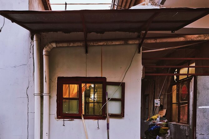 Small-Group Shanghai's Old City Walking Exploration - Stop 2: Longmen Cun South Gate and the Shikumen houses