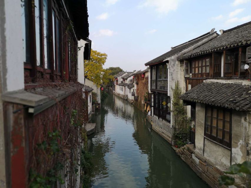 Su Zhou and Zhou Zhuang Water Village Day Tour - Key highlights worth knowing