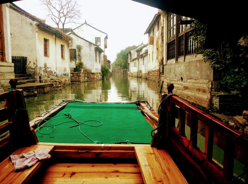 Su Zhou and Zhou Zhuang Water Village Day Tour - The sampan ride, the one moment that feels truly special