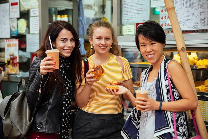 The 10 Tastings of Hong Kong With Locals: Private Street Food Tour - Sheung Wan wet market stop, where food culture starts