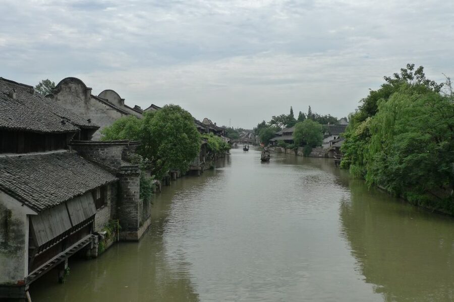 Wuzhen Private Full-Day Tour from Shanghai - Old schools and the performance stage: daily life beyond the canals